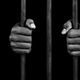 Black woman behind bars